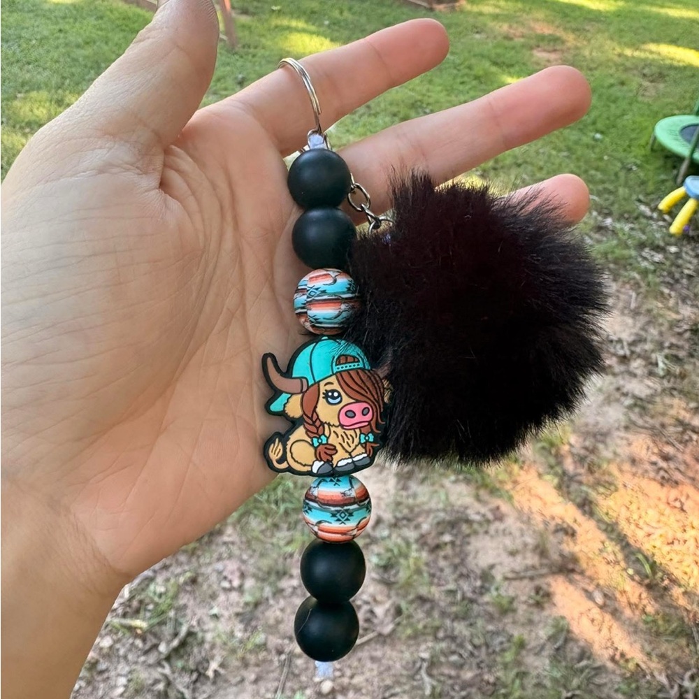 Black and Brown Key Holder with Cartoon Charm